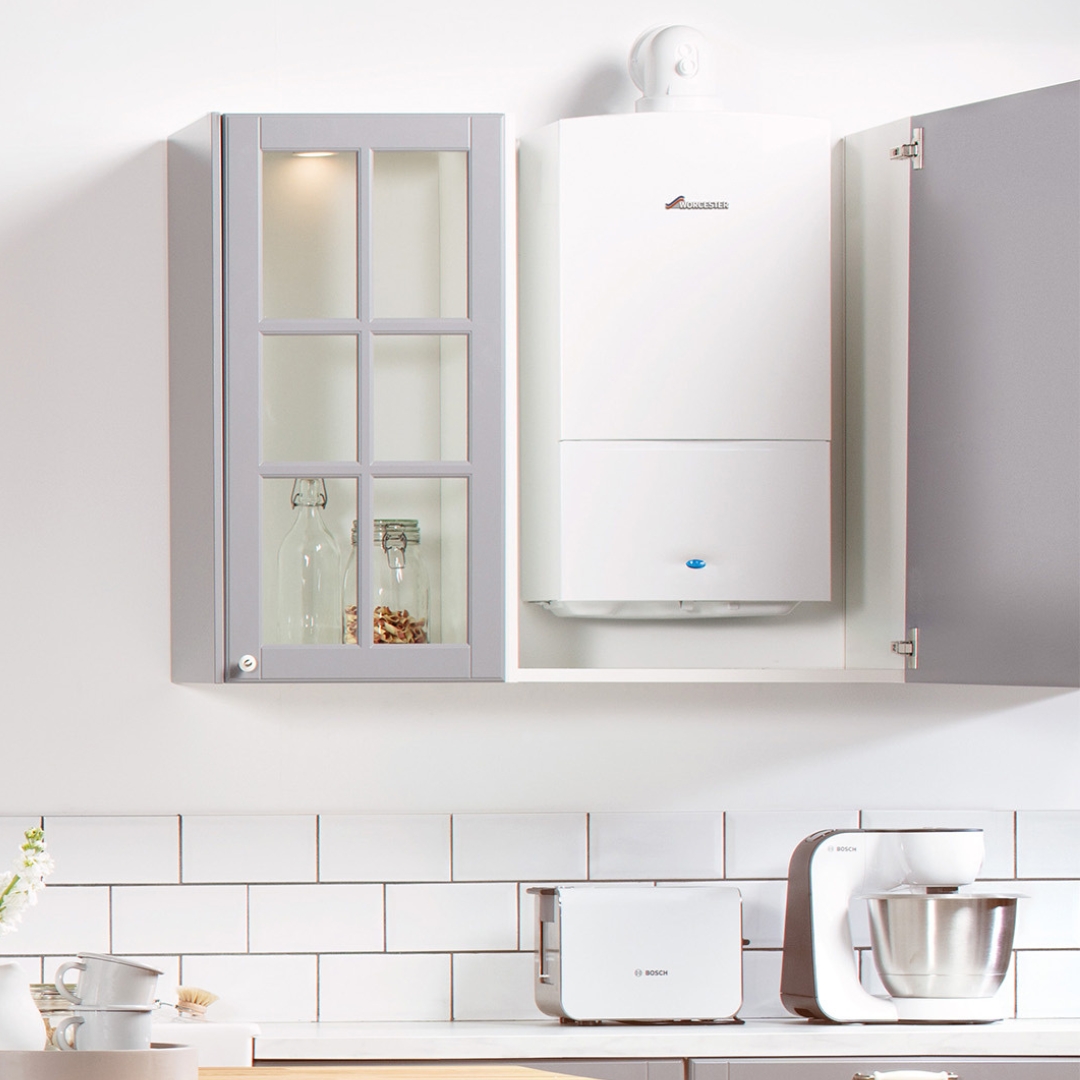 WORCESTER BOSCH boiler in the kitchen cupboard